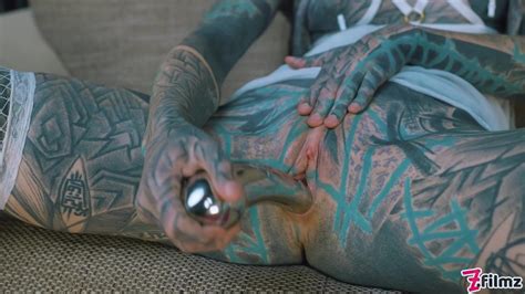 Anuskatzz Shoves A Stainless Steel Dildo Up Her Ass