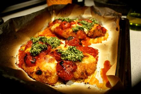 Chicken Schnitzel With Spicy Tomatoes Bocconcini And Pesto