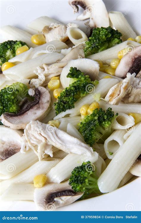 Mixed Salad with Eggs, Pasta, Mushrooms and Chicken Meat Stock Photo