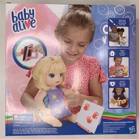 Hasbro Toys Baby Alive Finger Paint Doll Blonde Blue Eyes Paints Pees Drinks Diaper Bottle