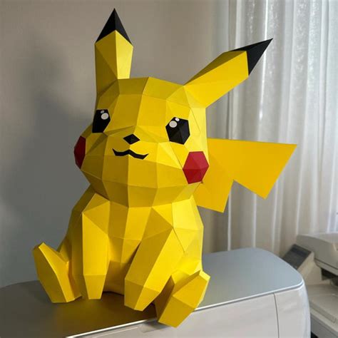 pikachu sitting papercraft diy template craftysvgshop