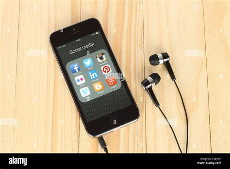 KIEV, UKRAINE - MAY 22, 2015: Smart phone with social media logos on