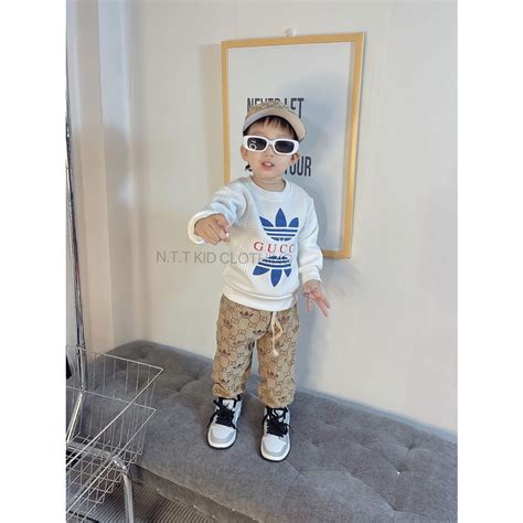 Mua SÉT BỘ GU CI SIÊU HOT HIT KÈM MŨ áo nỉ dập nổi gu ci Chất da cá loại hàng đẹp giá rẻ nhất