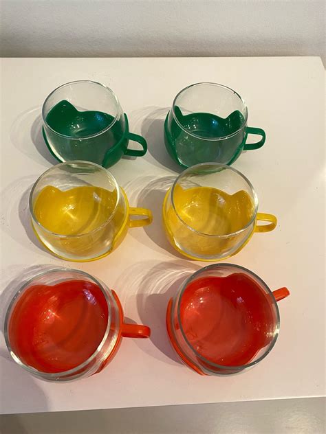 Se produkter som liknar Sex kaffekoppar med plasthand på Tradera