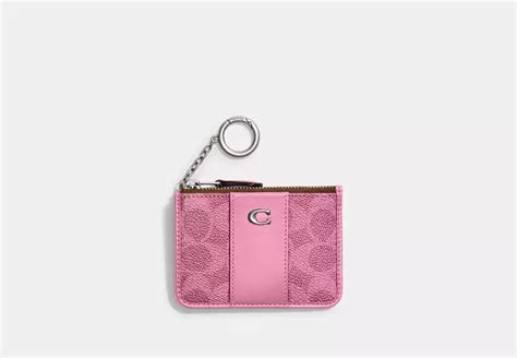 Coach® Essential Mini Skinny Id Case In Signature Canvas