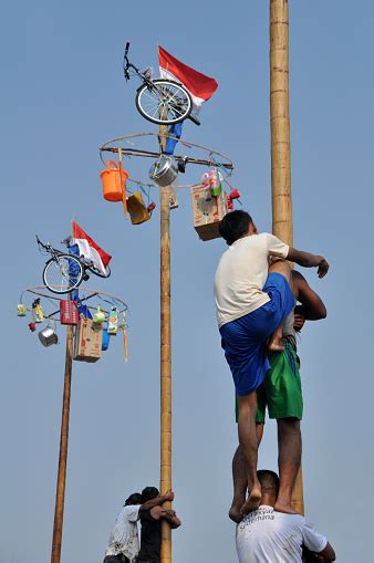 Panjat Pinang Or Areca Climbing Competition In Celebration Of