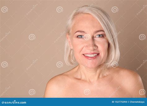 Portrait Of Charming Mature Woman With Healthy Beautiful Face Skin And