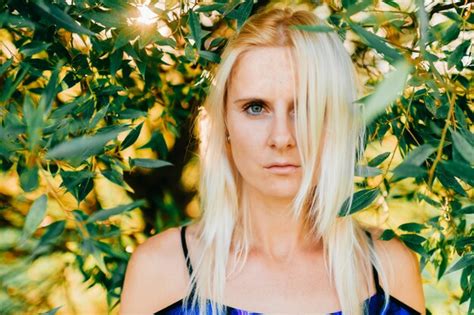 Premium Photo Beautiful Blonde Girl Posing At Nature