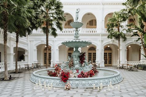 Tessa And Seans Disney Inspired Proposal At The Raffles Singapore Fountain
