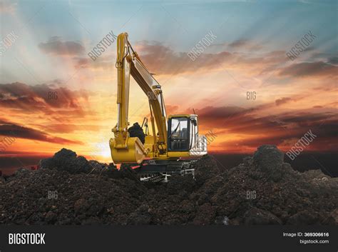 Excavators Digging Image And Photo Free Trial Bigstock