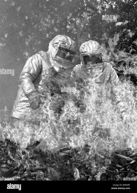 Testing Heat Resistant Suits In The Open Flame Stock Photo Alamy