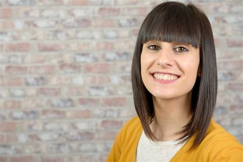Premium Photo Fashionable Brunette Wearing Bright Yellow Clothes