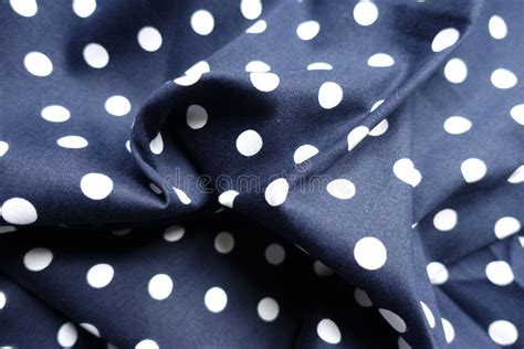 Draped Dark Blue And White Cotton With Polka Dot Pattern Stock Image