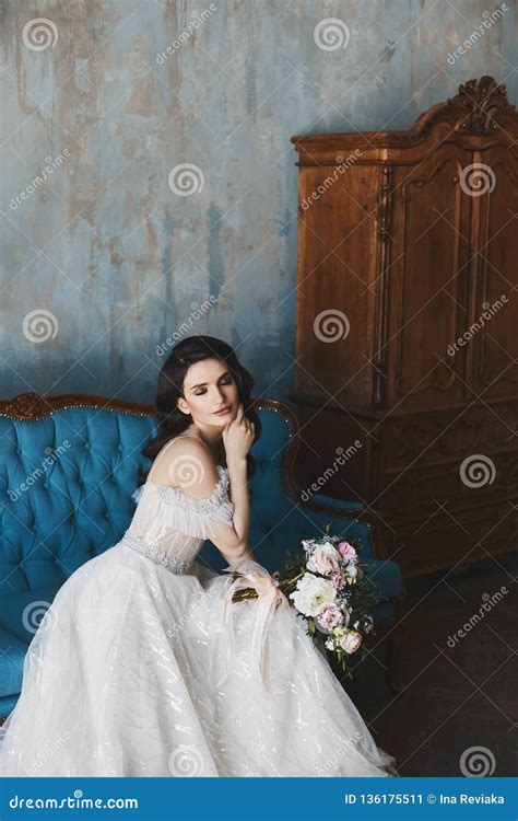 Sensual And Brunette Model Girl With Bright Makeup In Fashionable Lace Dress With Naked