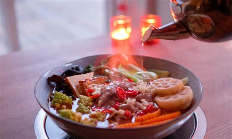 Social dining med distancing Populære Hot Pot genåbner