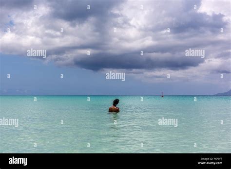 Happy young woman in a bikini lying at the beach Fotos und Bildmaterial in hoher Auflösung Alamy