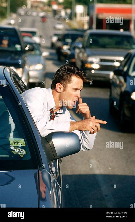 Austin, Texas USA: Businessman yelling at other drivers in rush-hour ...