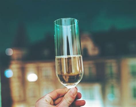 Premium Photo Close Up Of Hand Holding Glass Of Wine