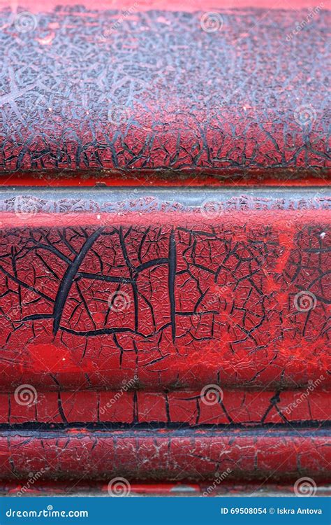 Cracked Red Paint On Grunge Metal Surface Macro Stock Photo