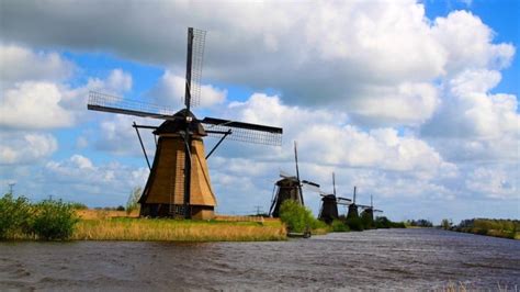 Cycling at the Windmills of Kinderdijk in South Holland