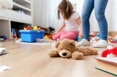 children playing   messy room  throwing toys  books