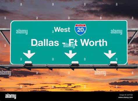 Dallas Ft Worth Interstate 20 West Highway Sign With Sunrise Sky Stock