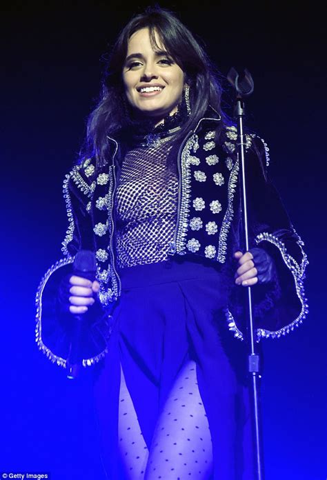 Camila Cabello Sports Daring Sheer Blouse With Nude Bodysuit And Sparkling Coat On First Solo