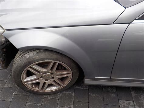 Blotnik Przod Lewy Mercedes C W Niska Cena Na Allegro Pl