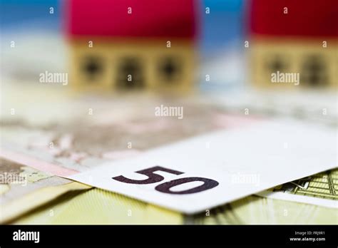 Figurine Wooden Houses On Blue Background Stock Photo Alamy