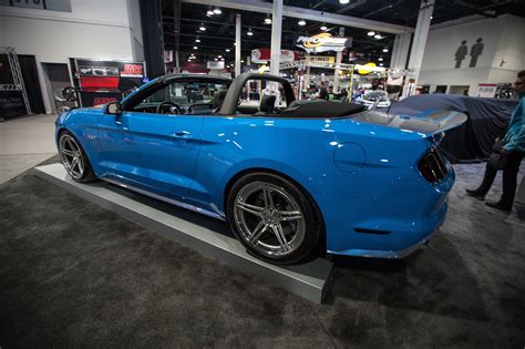 Blue Convertible Ford Mustang Dressed Up In Body Kit — Gallery
