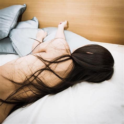 Premium Photo Rear View Of Naked Woman Lying On Bed
