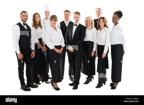 Portrait Of Confident Restaurant Staff Standing In Row Stock Photo Alamy