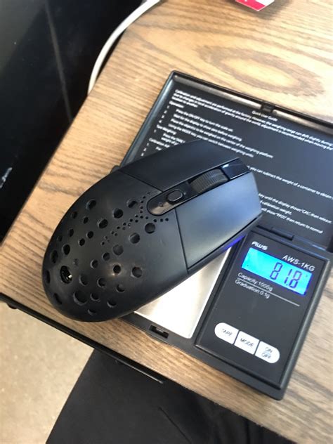 Took a drill to the G305 to find out the weight. : MouseReview
