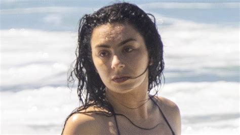 Charli XCX Shows Off Her Incredible Figure In A Skimpy Black Bikini As She Hits The Beach In