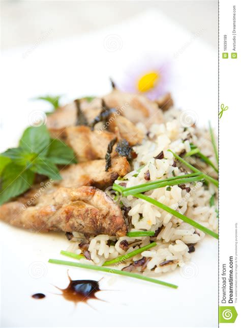 Risotto with Grilled Pork Meat Stock Image - Image of rice, onion: 16939189