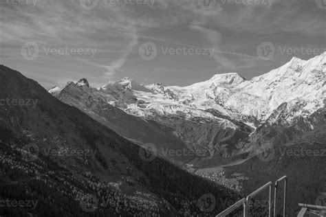 hiking in the swiss alps 12951563 Stock Photo at Vecteezy