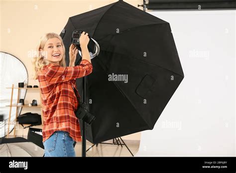 professional photographer working  studio stock photo alamy