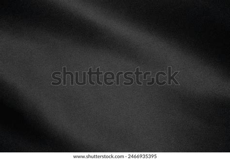 close  smooth slightly reflective black fabric stock photo