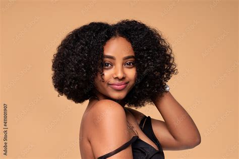 Beauty Portrait Of African American Woman With Beautiful Eyes And Clean Healthy Skin On Nude