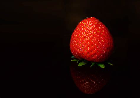Download Background Black With Strawberry Wallpaper