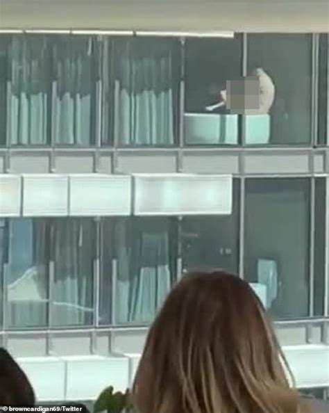 Stunned Office Workers Watch On As Naked Couple In Nearby Apartment Block Have Sex In Full View