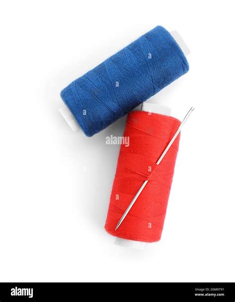 Colorful Threads And Needle On White Background Stock Photo Alamy