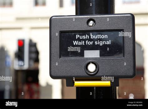 Push Button Wait For Signal Pedestrian Crossing Button On A Street In