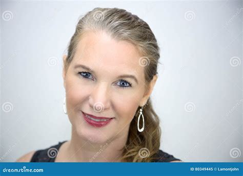 Mature Blonde Female Head Shot Looking At Camera Smiling Stock Image Image Of Hips Female