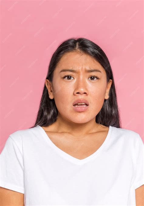 Free Photo Woman Looking At Camera And Being Scared
