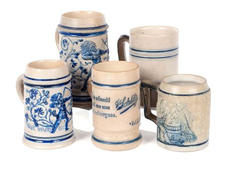 Lot - FIVE CERAMIC BEER MUGS