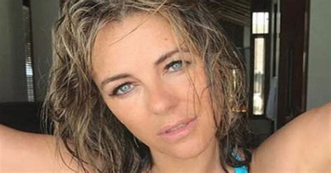 Liz Hurley Flaunts Assets In Sizzling Bikini Expos Daily Star