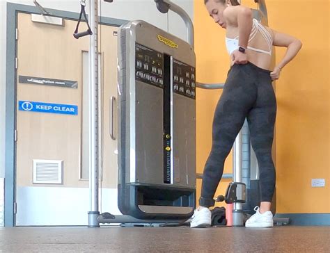 Gym Brunette In Tight Black Camo Leggings Bending Over Part Spandex Leggings Yoga Pants