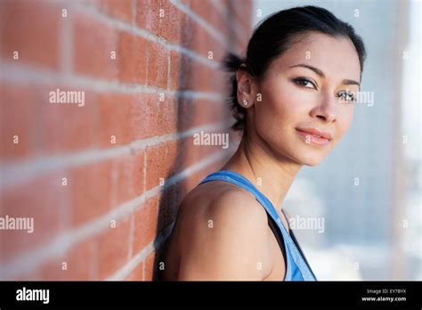 Lady By Brick Wall Hi Res Stock Photography And Images Alamy