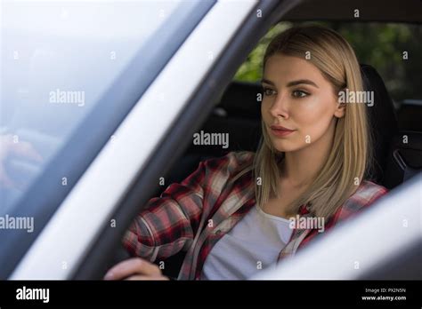 Beautiful Blonde Girl Driving White Car Stock Photo Alamy